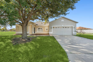Photo of the front of a house in Poinciana, Kissimmee at 554 Nogales Court.